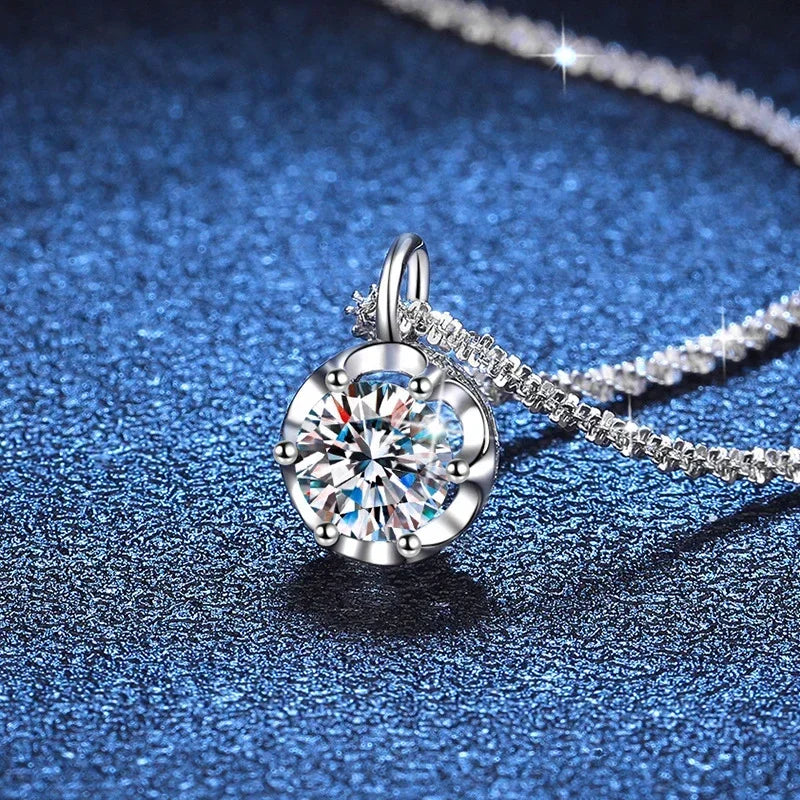 ilver chain, with small Zircon stones surrounding the Moissanite  necklace